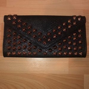 Gold studded clutch